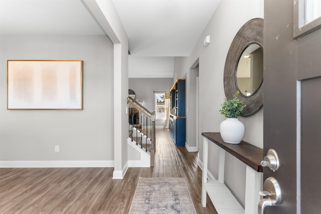 foyer entrance featuring hardwood / wood-style floors