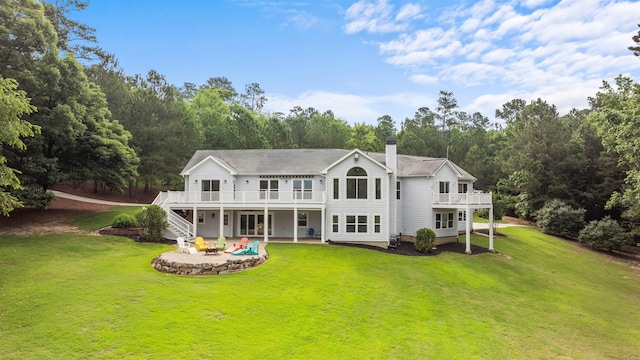 1060 Old Rock Rd, Greensboro, GA 30642 - rear view of property featuring stairs, a patio, a lawn, and a chimney