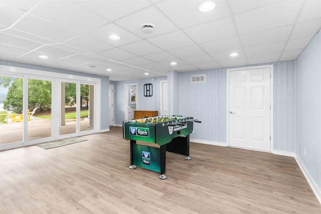 1060 Old Rock Rd, Greensboro, GA 30642 - playroom with wood finished floors, baseboards, a drop ceiling, and recessed lighting