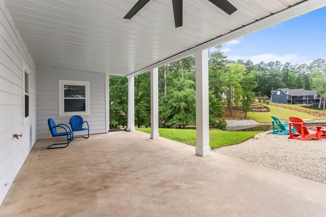 1060 Old Rock Rd, Greensboro, GA 30642 - view of patio / terrace featuring ceiling fan and view of scattered trees