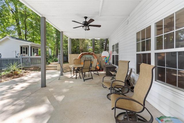 view of patio featuring a ceiling fan