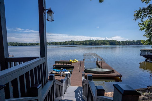 dock with a water view and a forest view