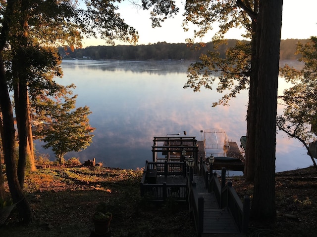 dock area featuring a water view