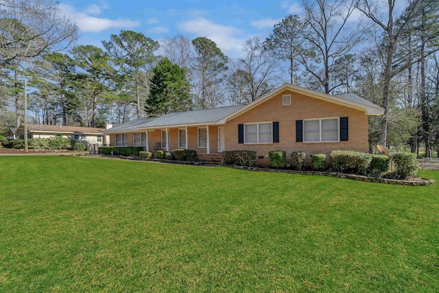 ranch-style house with a front lawn