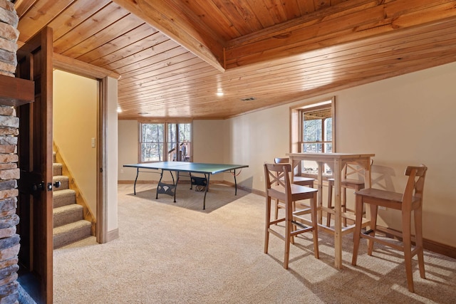 rec room featuring wood ceiling, baseboards, and carpet flooring