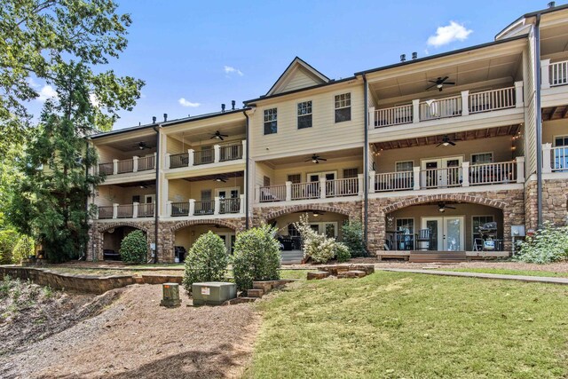 deck featuring area for grilling, french doors, and ceiling fan