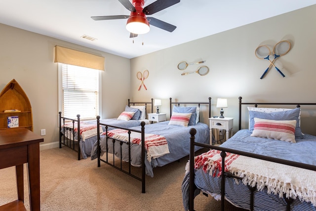 bedroom featuring ceiling fan and carpet floors