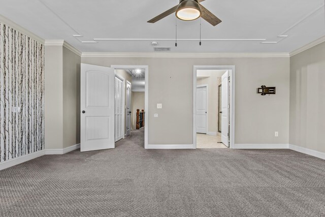 carpeted bedroom with ornamental molding