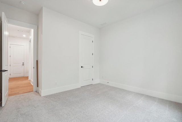 1280 Lake Dr, Greensboro, GA 30642 - unfurnished room featuring baseboards and light colored carpet