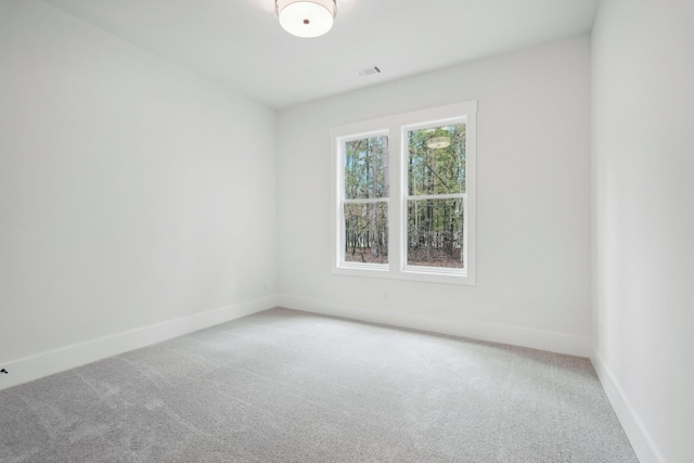 1280 Lake Dr, Greensboro, GA 30642 - empty room with light carpet, baseboards, and visible vents