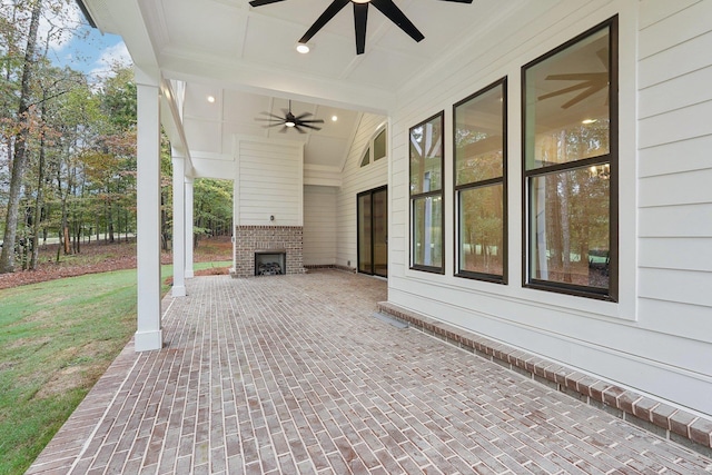 1280 Lake Dr, Greensboro, GA 30642 - view of patio / terrace featuring ceiling fan and an outdoor brick fireplace