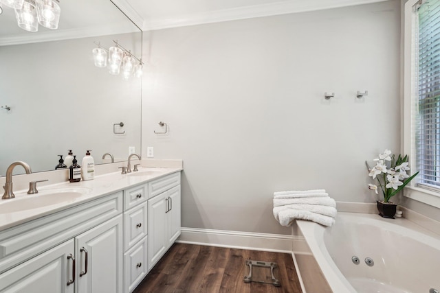 1050A Tailwater, Greensboro, GA 30642 - full bath featuring double vanity, a whirlpool tub, crown molding, and wood finished floors
