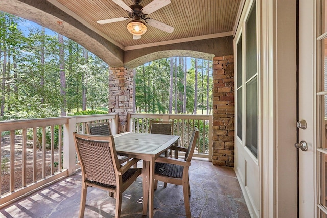 1050A Tailwater, Greensboro, GA 30642 - view of patio / terrace with ceiling fan, outdoor dining space, and view of wooded area