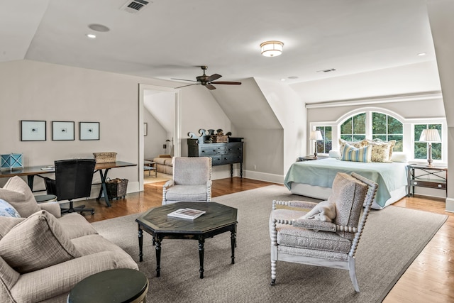 2030 Linger Longer Dr, Greensboro, GA 30642 - bedroom with visible vents, wood finished floors, and vaulted ceiling