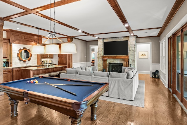 2030 Linger Longer Dr, Greensboro, GA 30642 - game room featuring wood finished floors, pool table, wainscoting, ornamental molding, and a fireplace