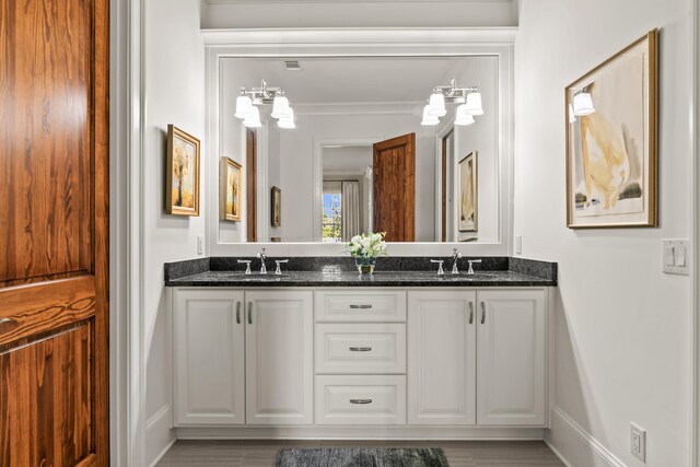 2030 Linger Longer Dr, Greensboro, GA 30642 - full bath with baseboards, double vanity, and a sink