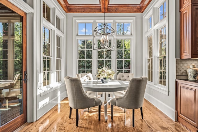2030 Linger Longer Dr, Greensboro, GA 30642 - sunroom featuring a chandelier, coffered ceiling, and beam ceiling