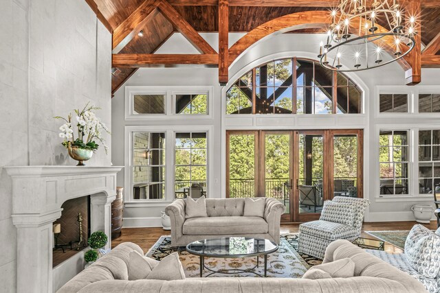 2030 Linger Longer Dr, Greensboro, GA 30642 - sunroom featuring a notable chandelier and beamed ceiling