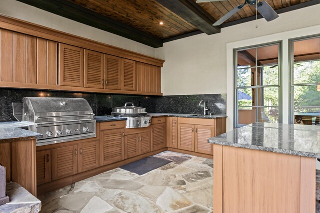 2030 Linger Longer Dr, Greensboro, GA 30642 - kitchen featuring wooden ceiling, beam ceiling, ceiling fan, backsplash, and stone finish floor