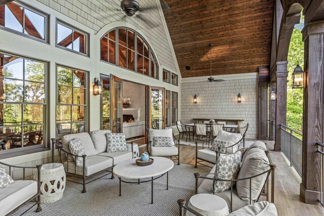 2030 Linger Longer Dr, Greensboro, GA 30642 - sunroom / solarium featuring ceiling fan, an outdoor living space, and plenty of natural light