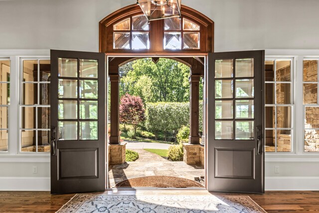 2030 Linger Longer Dr, Greensboro, GA 30642 - doorway to outside featuring wood finished floors and baseboards