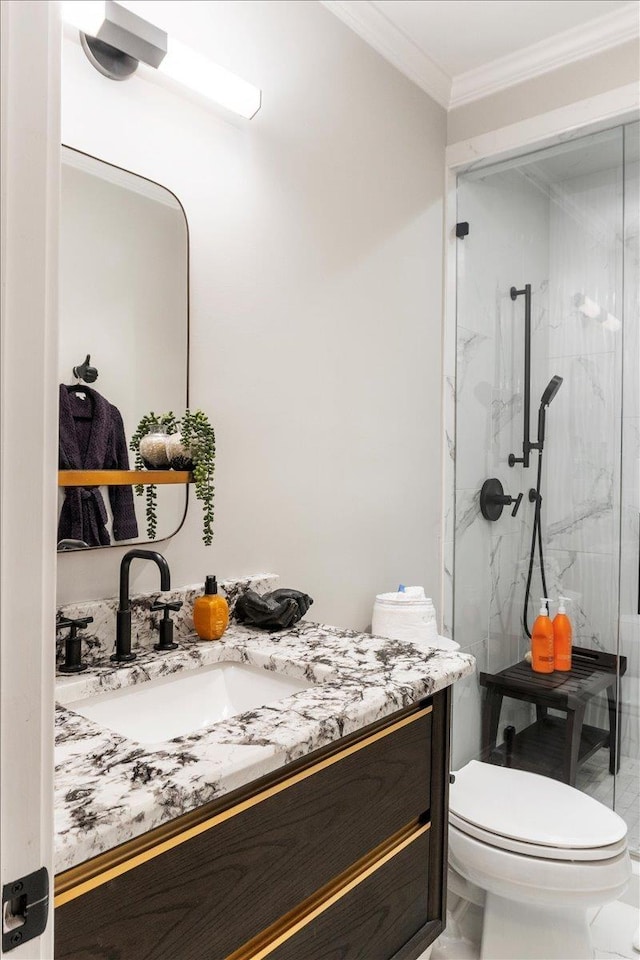 bathroom featuring a marble finish shower, toilet, marble finish floor, crown molding, and vanity