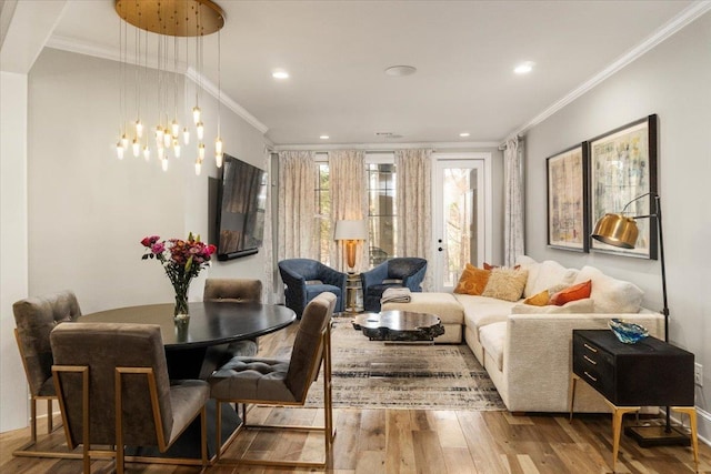 interior space with recessed lighting, wood finished floors, and crown molding