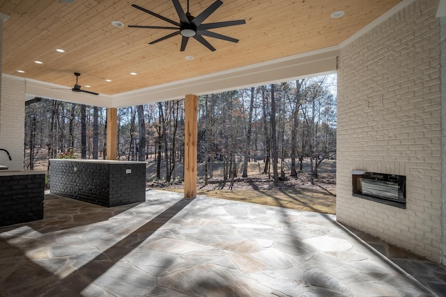 view of patio featuring a ceiling fan