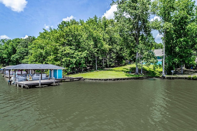 138B Little River Run, Eatonton, GA 31024 - dock with boat lift, a water view, and a yard