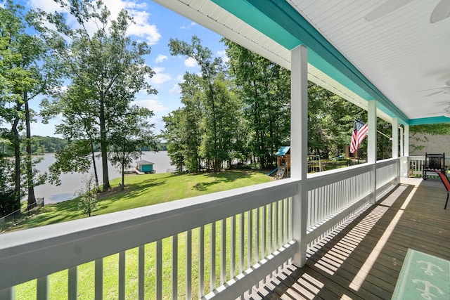 138B Little River Run, Eatonton, GA 31024 - deck with ceiling fan, a playground, a lawn, and a water view