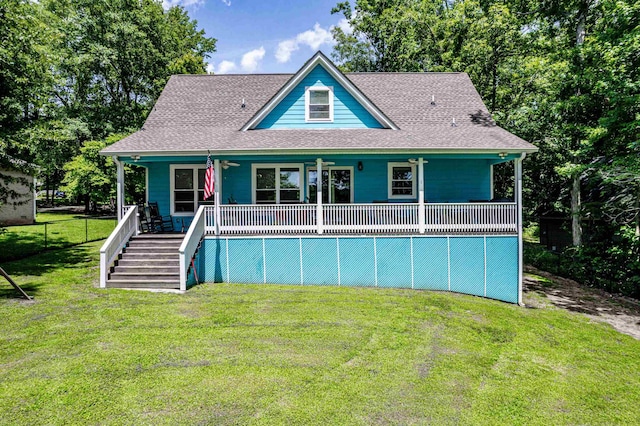 138B Little River Run, Eatonton, GA 31024 - rear view of property featuring stairway, a porch, roof with shingles, and a lawn