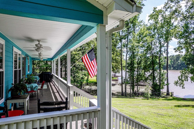 138B Little River Run, Eatonton, GA 31024 - deck featuring a ceiling fan and a yard
