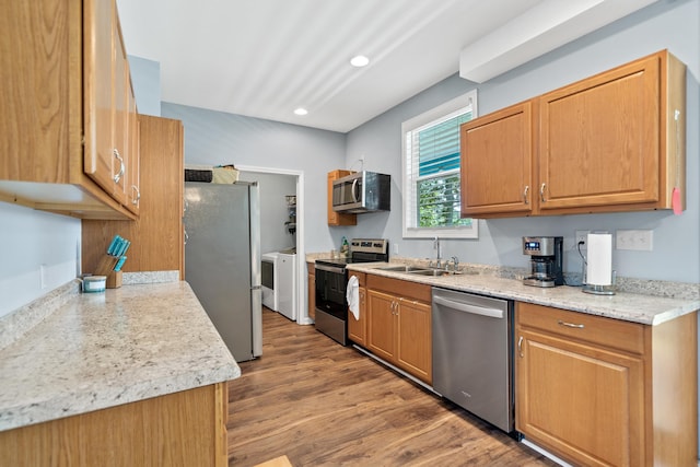 138B Little River Run, Eatonton, GA 31024 - kitchen featuring appliances with stainless steel finishes, wood finished floors, and recessed lighting