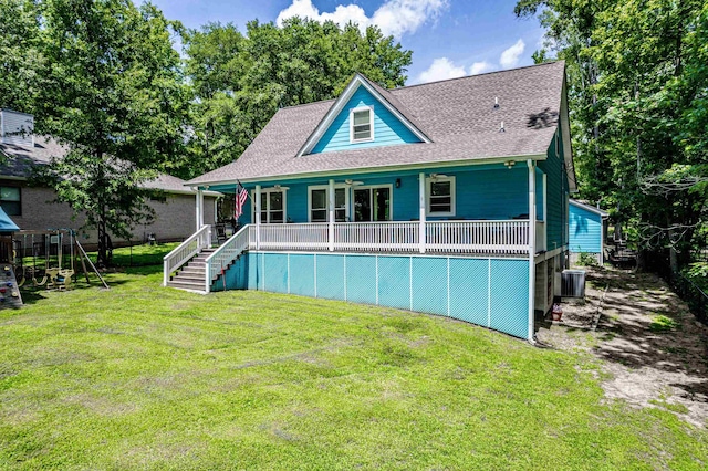 138B Little River Run, Eatonton, GA 31024 - rear view of property featuring a shingled roof and a yard