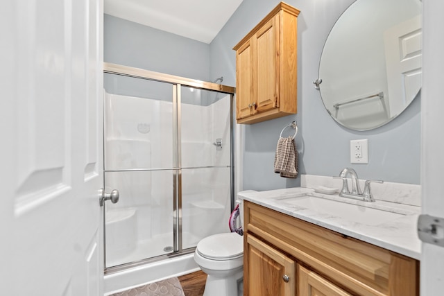 138B Little River Run, Eatonton, GA 31024 - bathroom with a stall shower, vanity, and wood finished floors