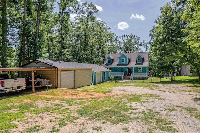 138B Little River Run, Eatonton, GA 31024 - view of front of house with an outdoor structure and a garage