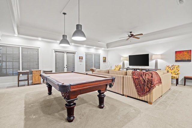 recreation room featuring billiards, light colored carpet, ornamental molding, a raised ceiling, and ceiling fan