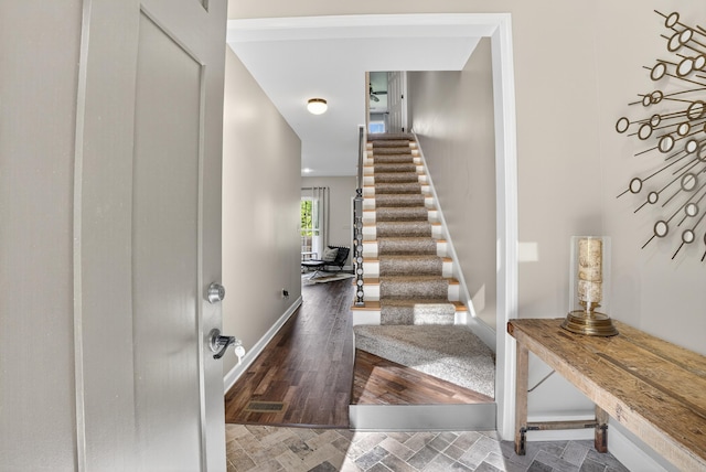 1005 Dennis St, Eatonton, GA 31024 - staircase with baseboards