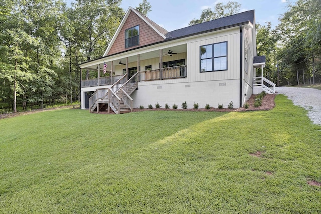 1005 Dennis St, Eatonton, GA 31024 - view of front of property with ceiling fan, stairs, a front lawn, and a porch