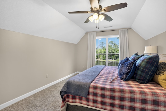 1005 Dennis St, Eatonton, GA 31024 - carpeted bedroom with vaulted ceiling and a ceiling fan