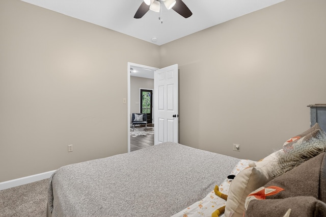 1005 Dennis St, Eatonton, GA 31024 - bedroom with a ceiling fan and carpet flooring