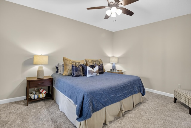 1005 Dennis St, Eatonton, GA 31024 - bedroom featuring light carpet and a ceiling fan
