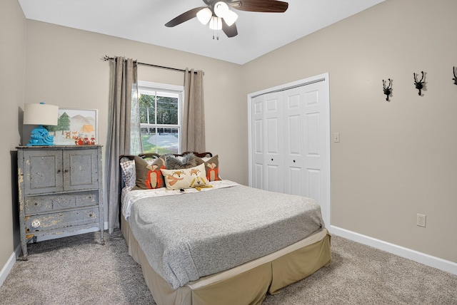 1005 Dennis St, Eatonton, GA 31024 - carpeted bedroom featuring a closet and a ceiling fan