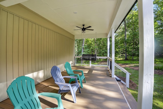 1005 Dennis St, Eatonton, GA 31024 - wooden porch featuring a ceiling fan