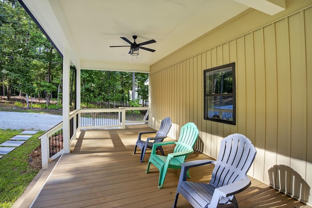1005 Dennis St, Eatonton, GA 31024 - wooden porch featuring a ceiling fan