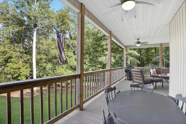 1005 Dennis St, Eatonton, GA 31024 - wooden terrace with a ceiling fan and an outdoor living space