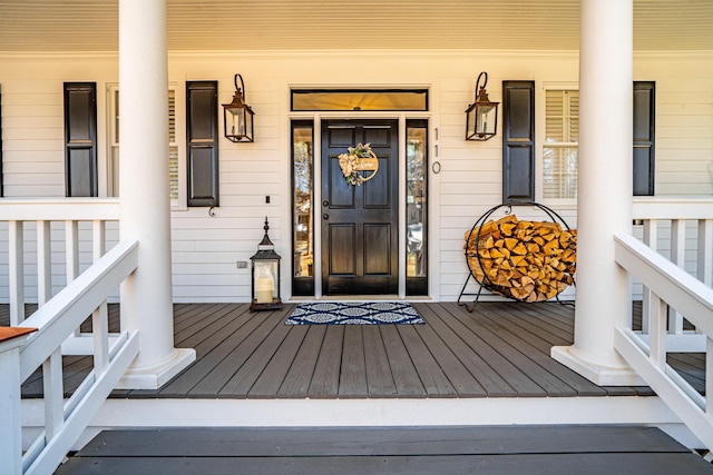 property entrance with covered porch