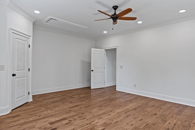 unfurnished room with ceiling fan, ornamental molding, and wood-type flooring