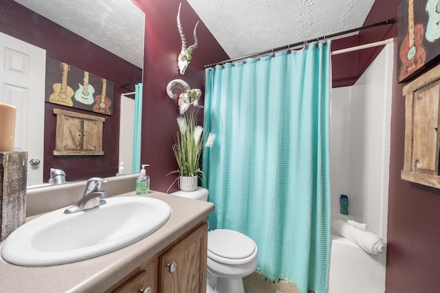 full bathroom with vanity, toilet, a textured ceiling, and shower / bath combo