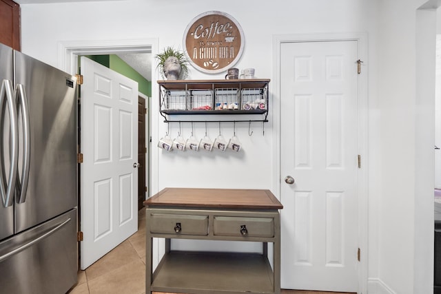 mudroom featuring light tile patterned floors